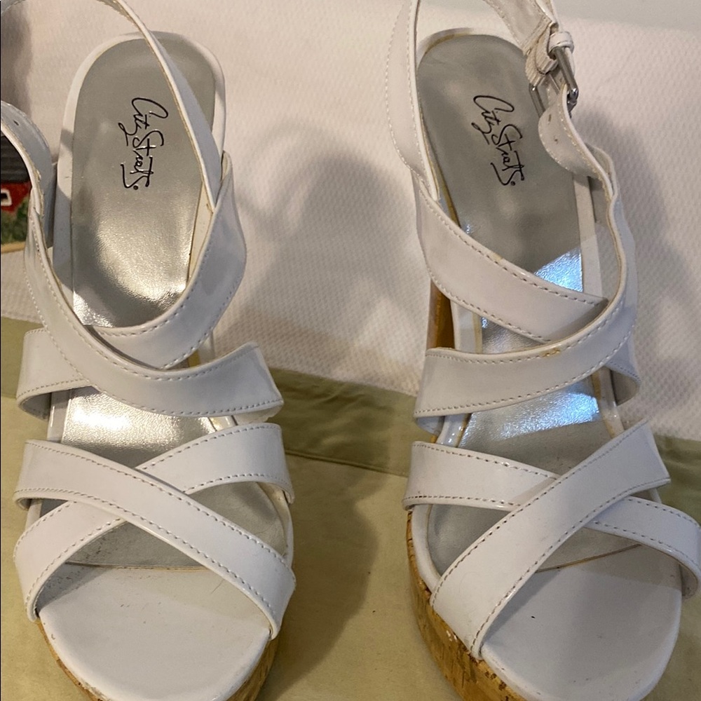 White Women's high heels in good shape.  See mark on the inside